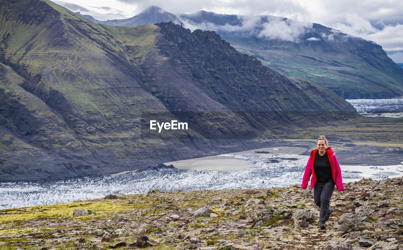 Woman hiking at skaftafell national park in south iceland