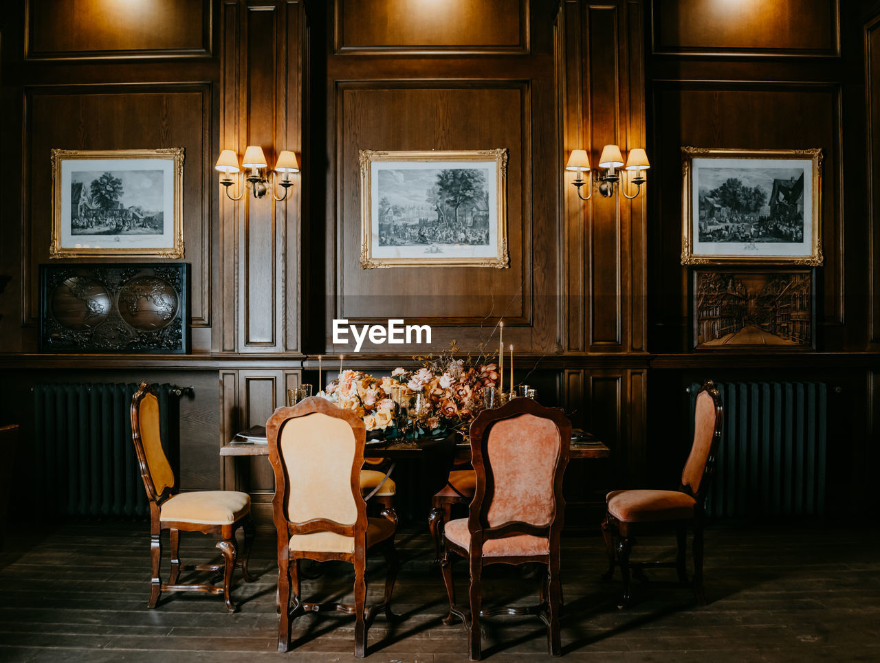 EMPTY CHAIRS AND TABLES IN ROOM