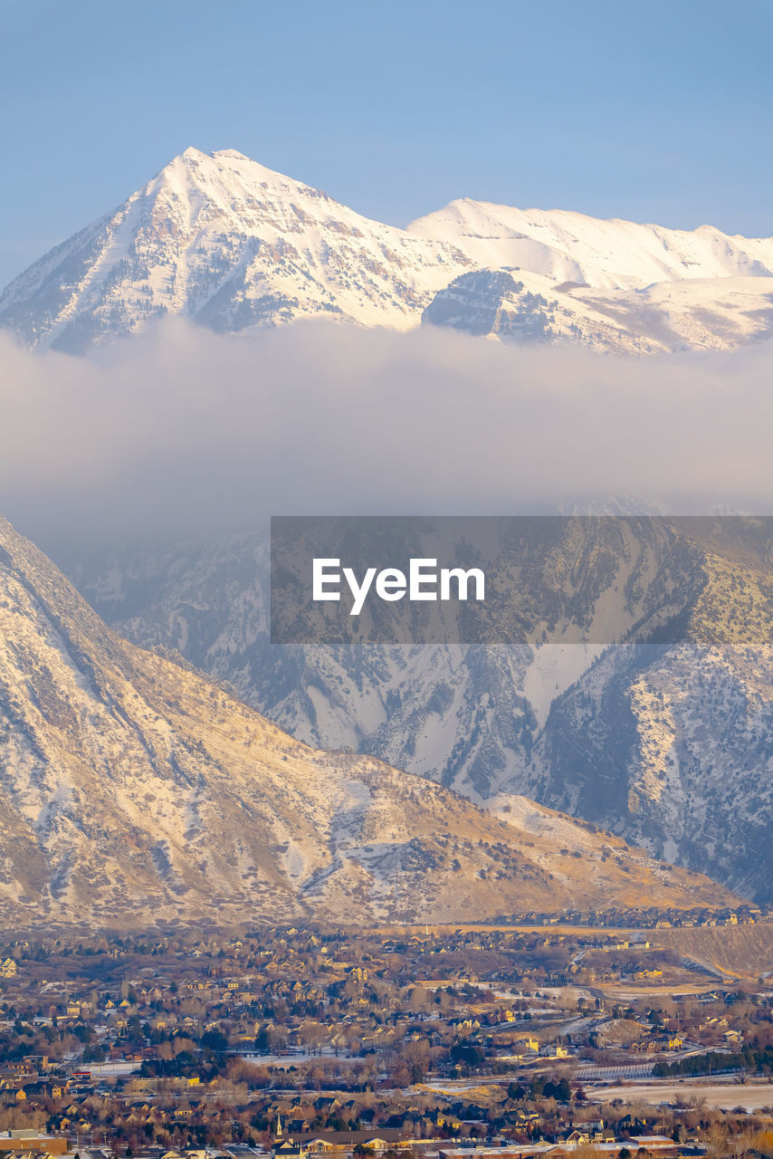 SNOWCAPPED MOUNTAINS AGAINST SKY