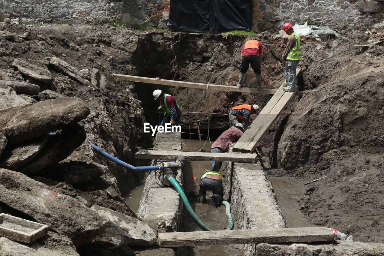 Construction workers working at site