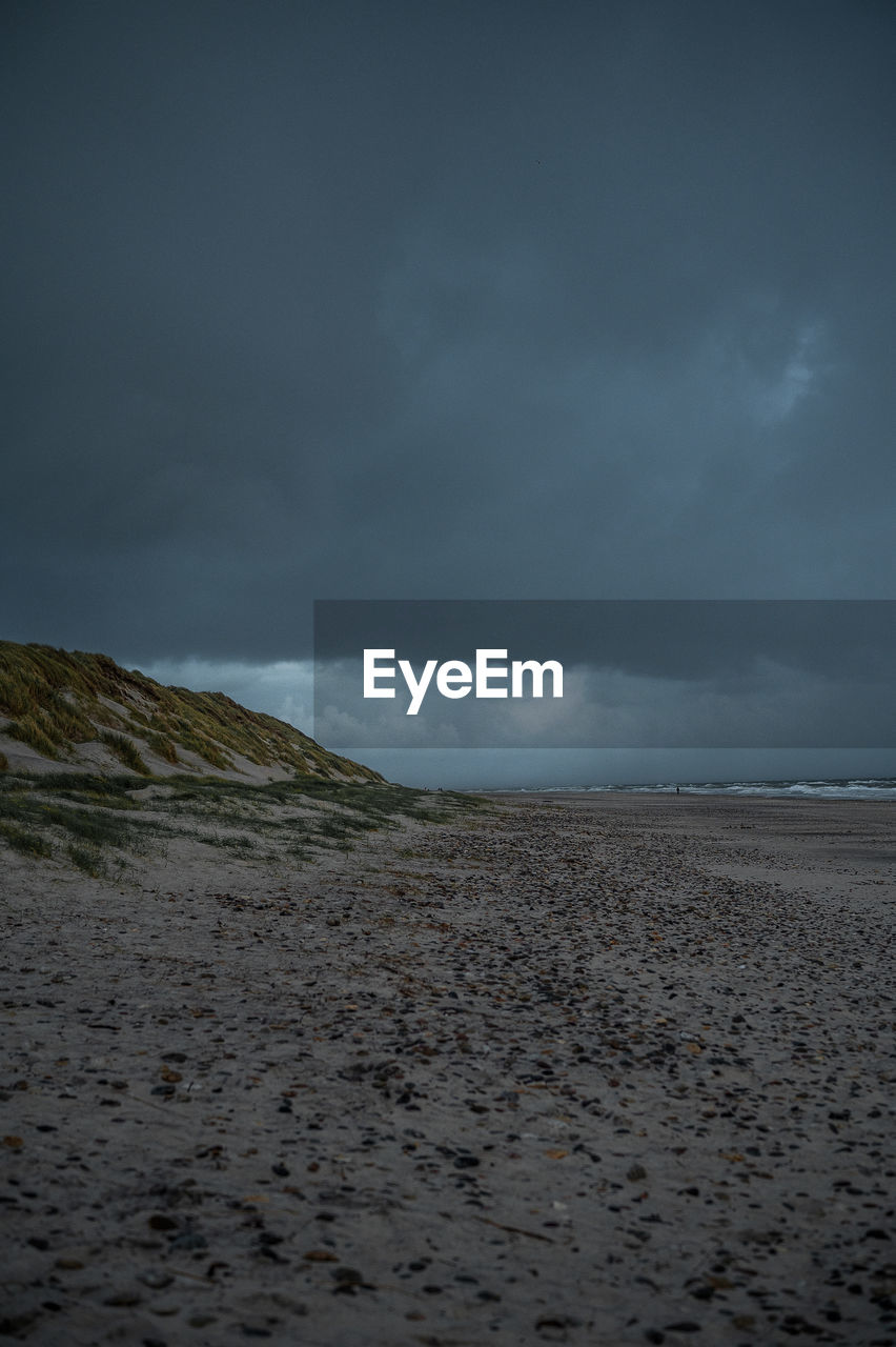 sky, cloud, horizon, sea, land, ocean, beauty in nature, scenics - nature, wave, environment, beach, nature, coast, storm, water, sand, landscape, shore, storm cloud, tranquility, dramatic sky, overcast, no people, tranquil scene, sunlight, morning, non-urban scene, outdoors, snow, dusk, natural environment, body of water, wind wave, reflection