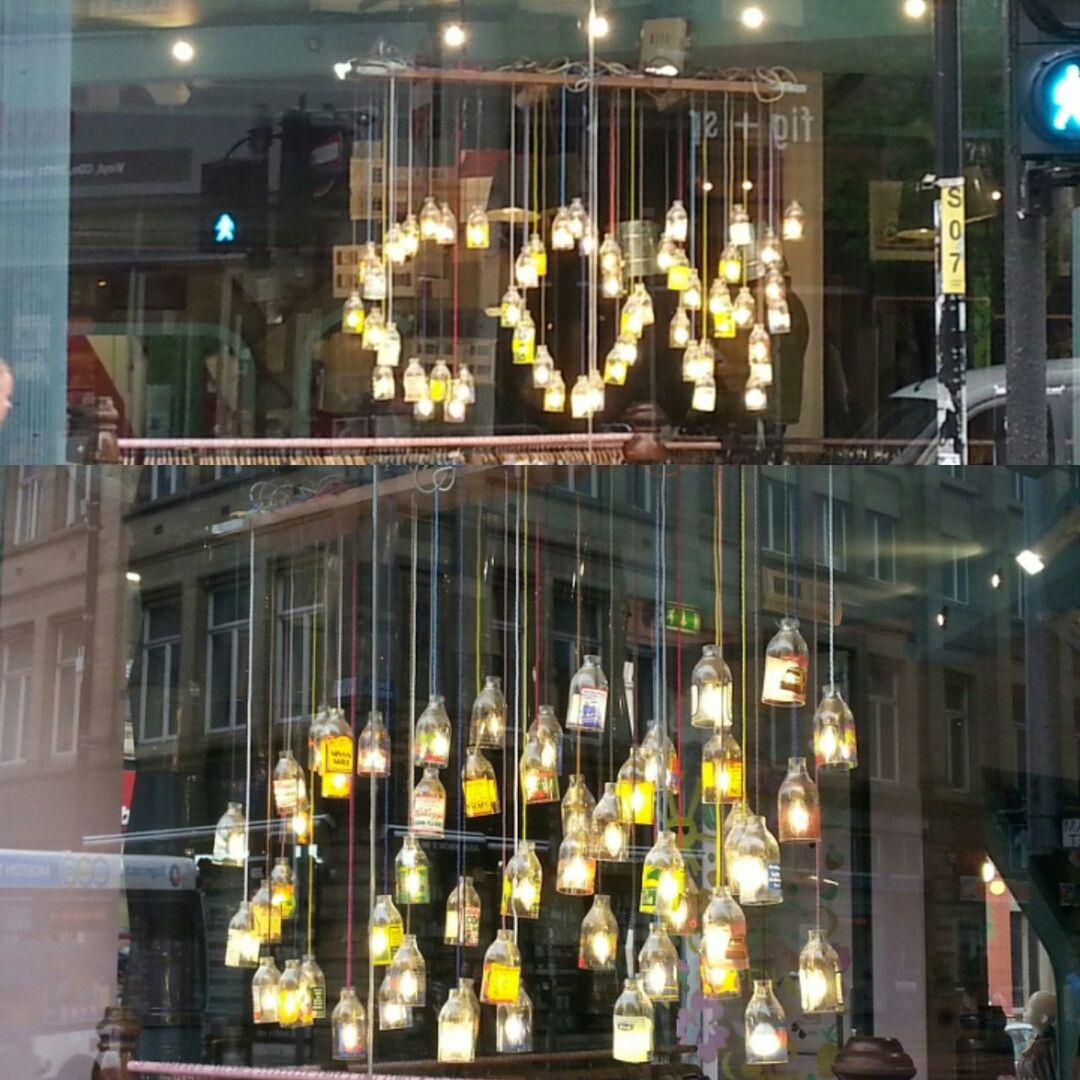 VIEW OF ILLUMINATED LIGHTS AT NIGHT