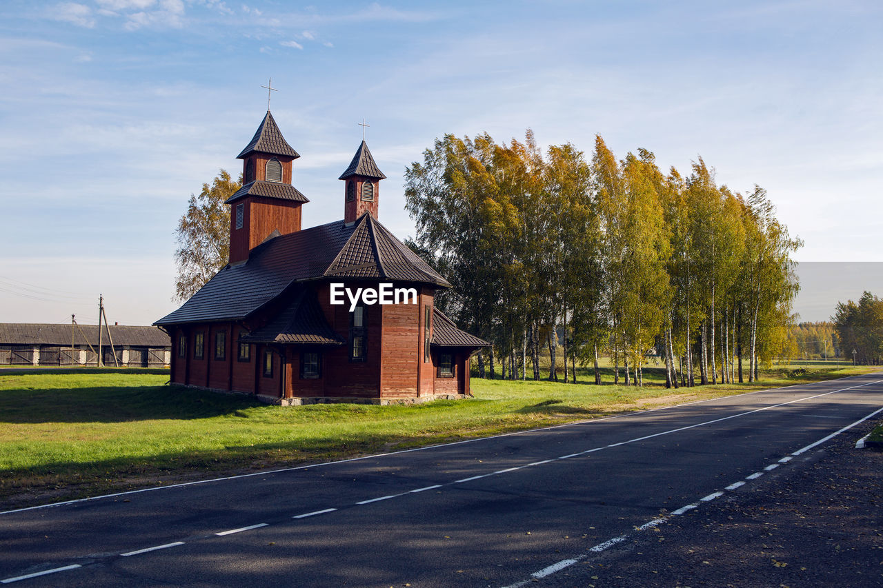 Old log church in russia in autumn