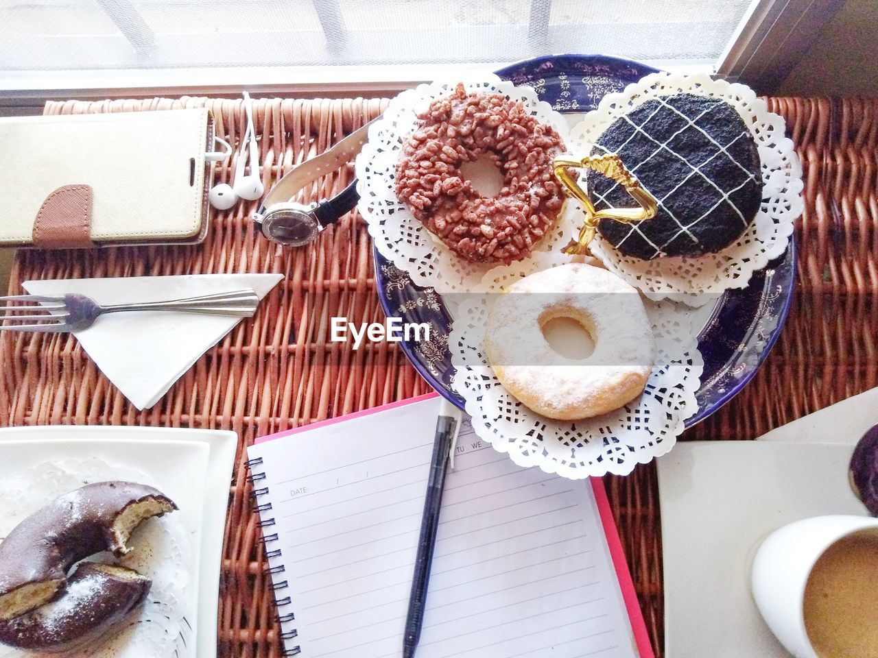 High angle view of donuts in plate on table