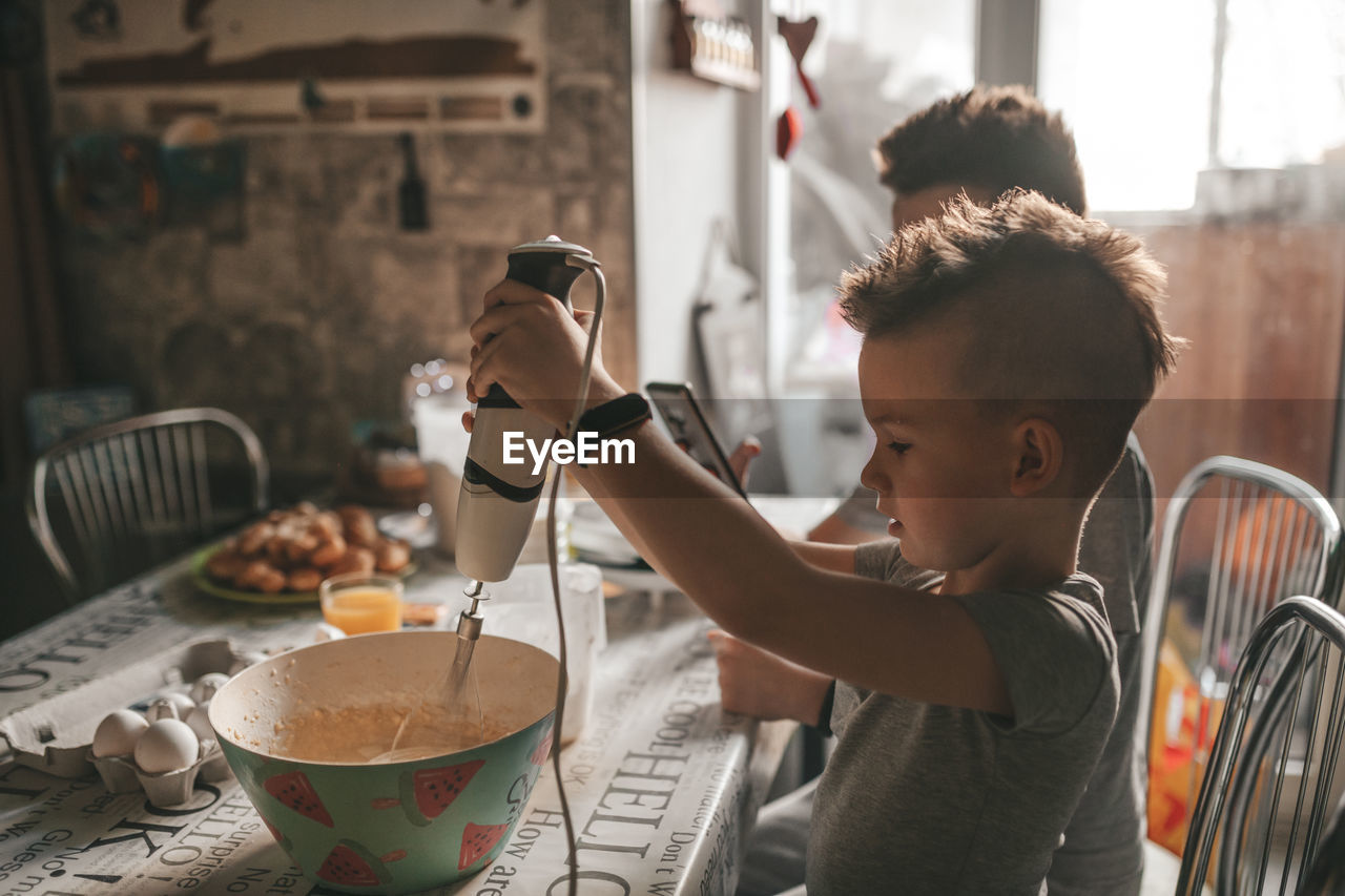 Close-up of boy drinking coffee