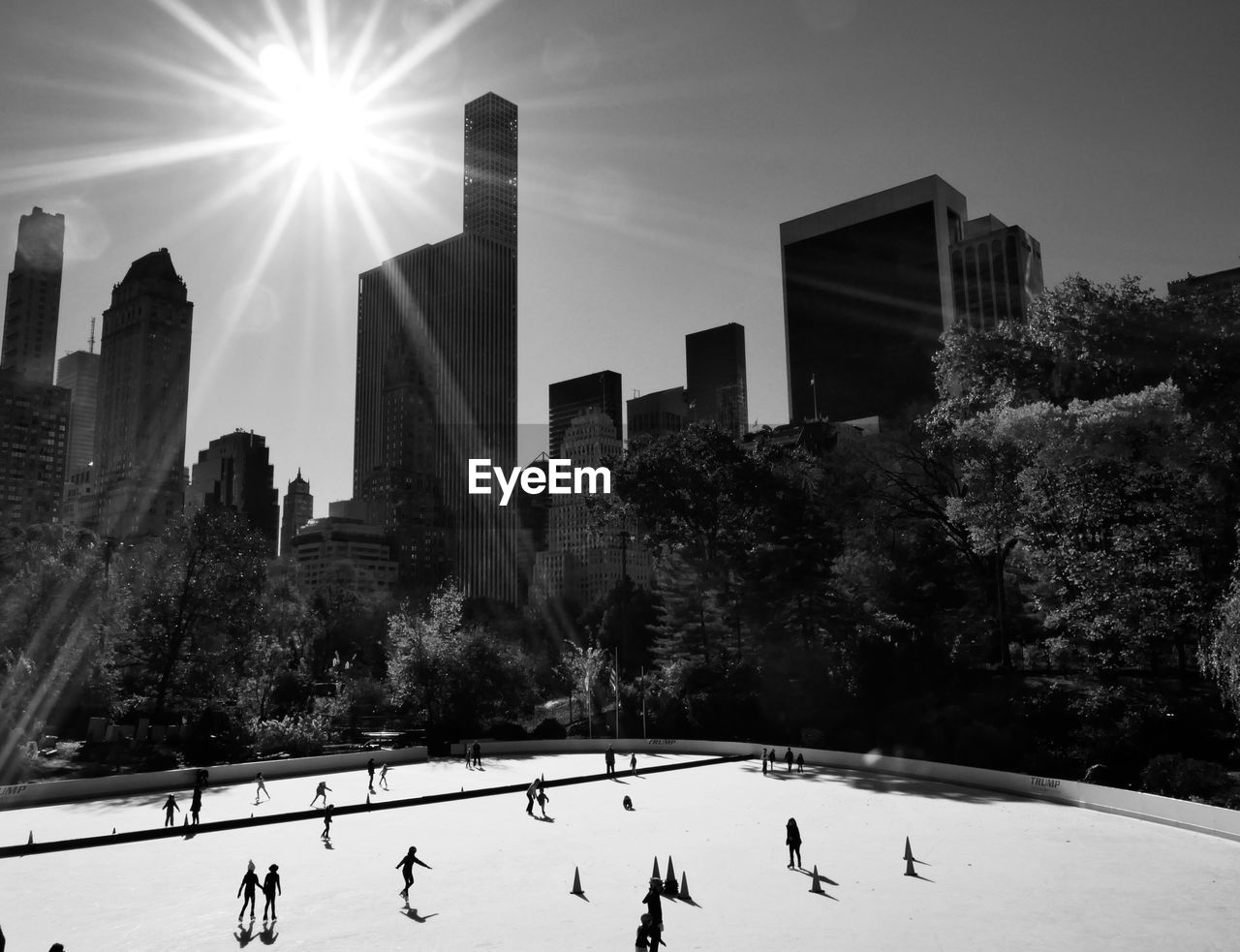 PEOPLE ON SNOW COVERED CITY