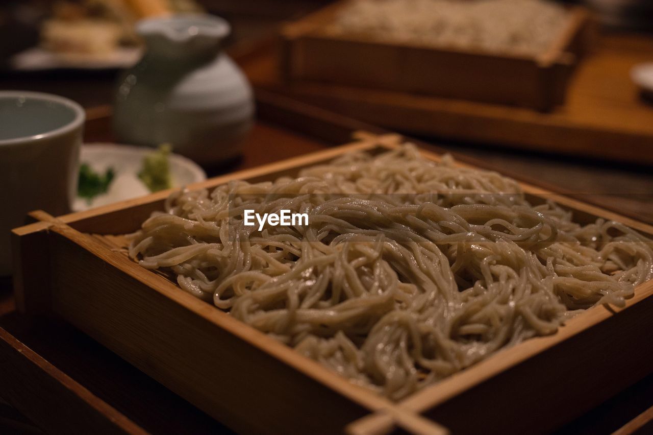 High angle view of noodles in container on table