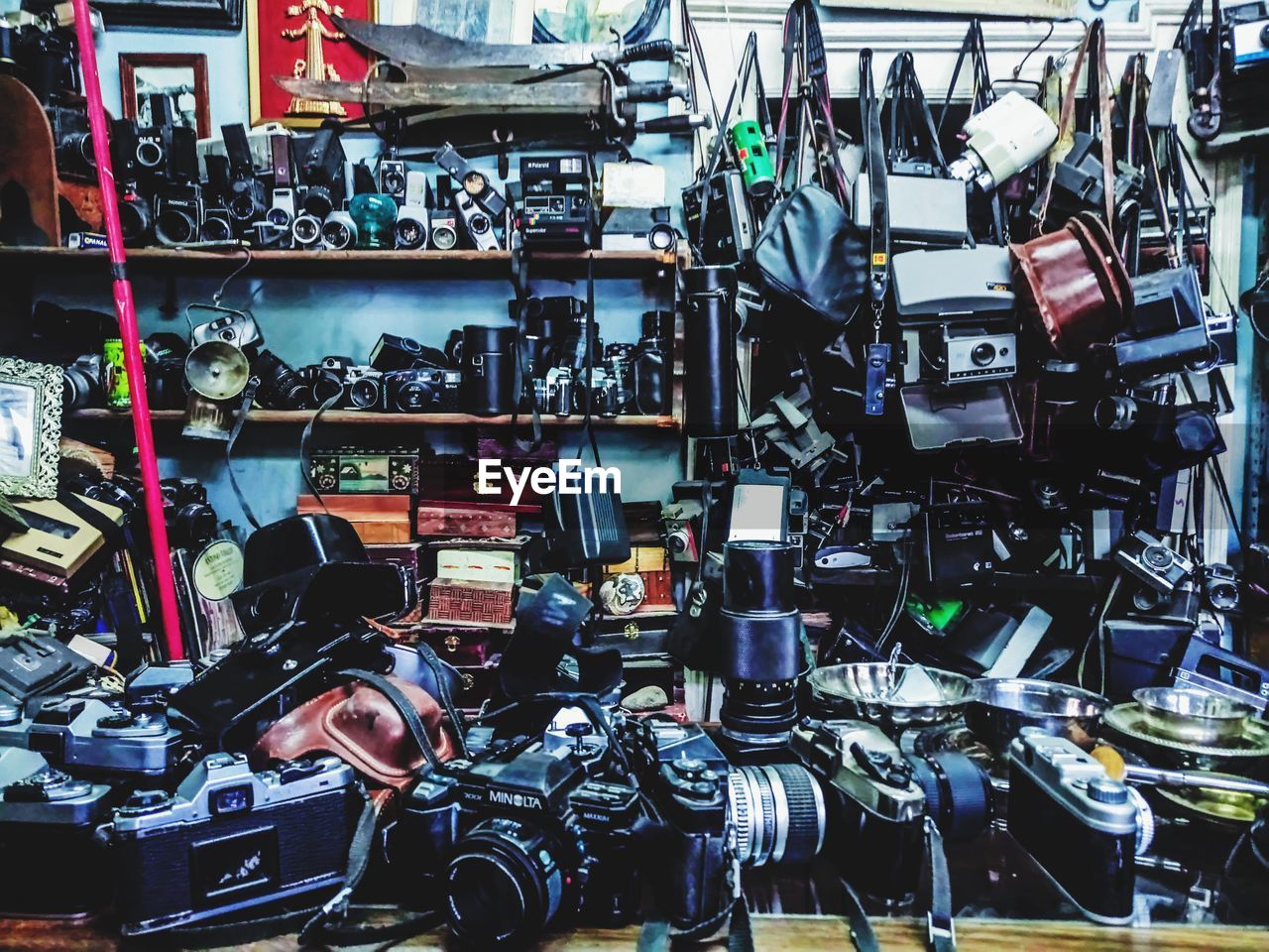 Full frame shot of photographic equipment for sale in store