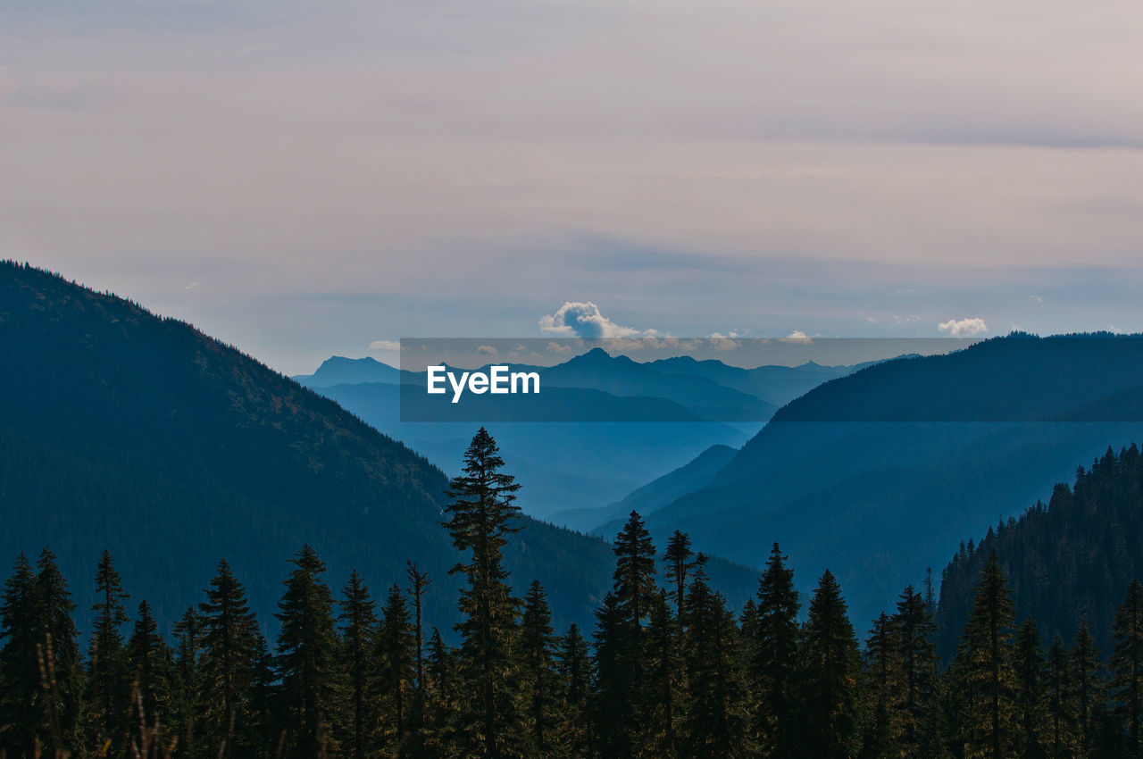 Scenic view of mountains against sky during sunset