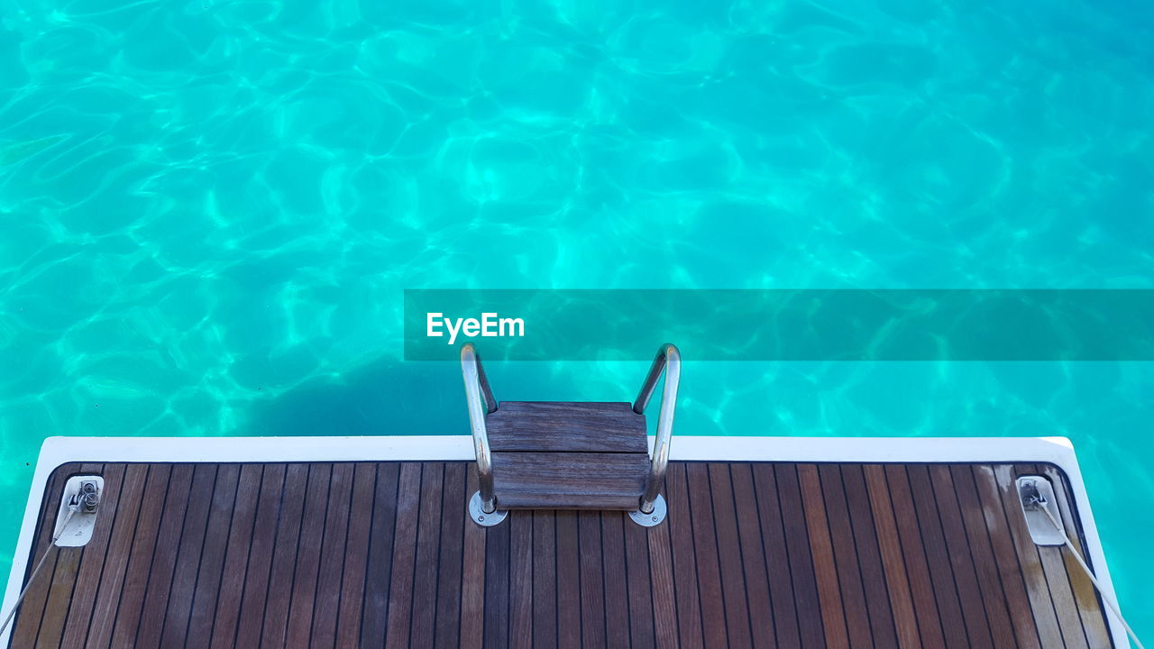 High angle view of railing on yacht in sea