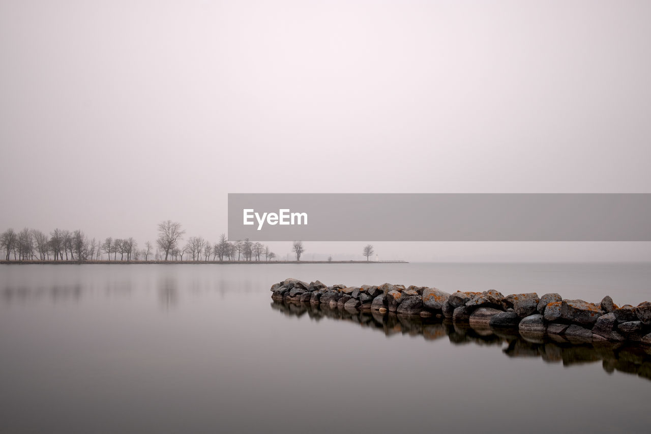 Scenic view of lake against clear sky