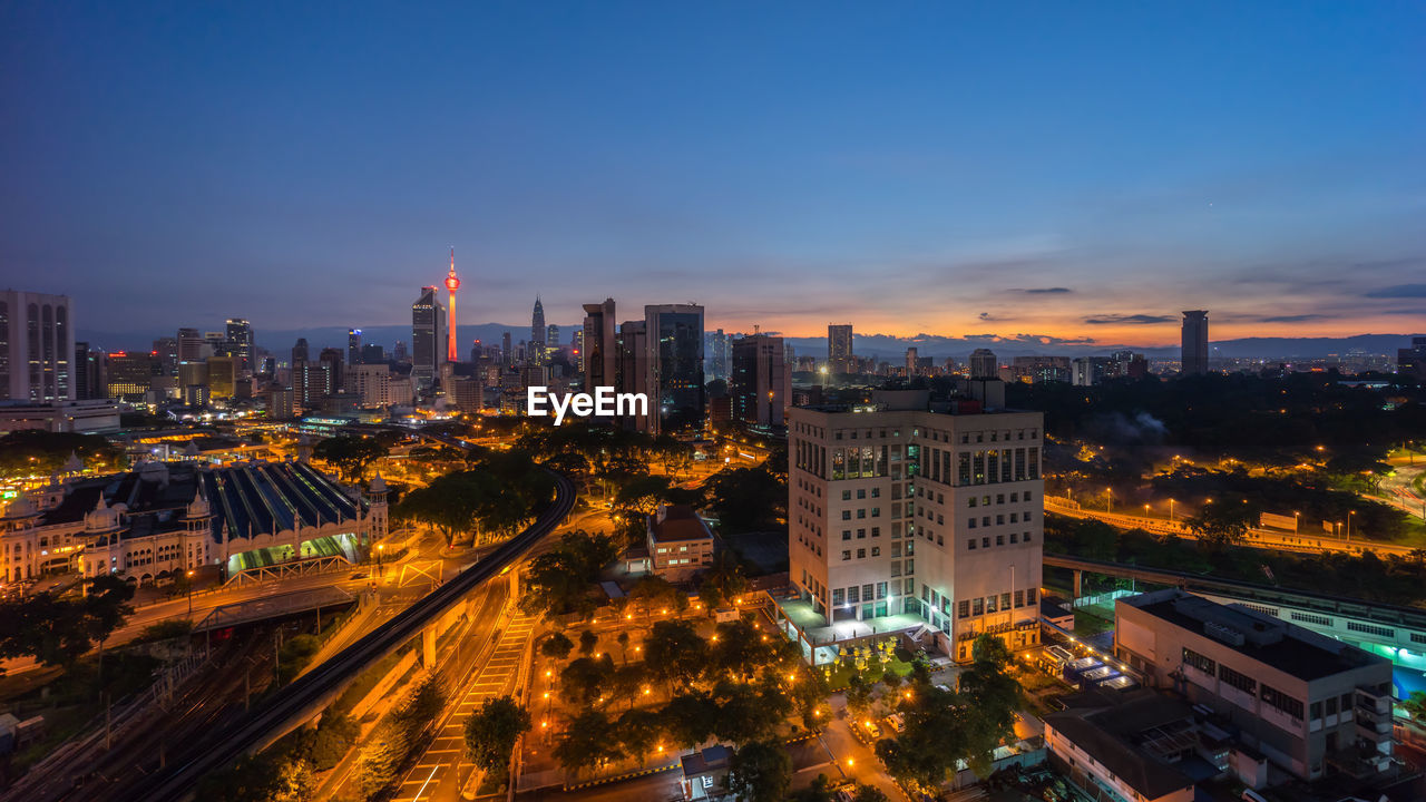 High angle view of cityscape against sky during sunset