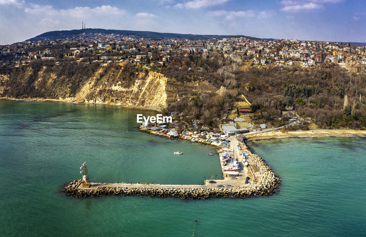 Aerial view from drone to the seacoast and the marina with boats and yachts. sea landscape 