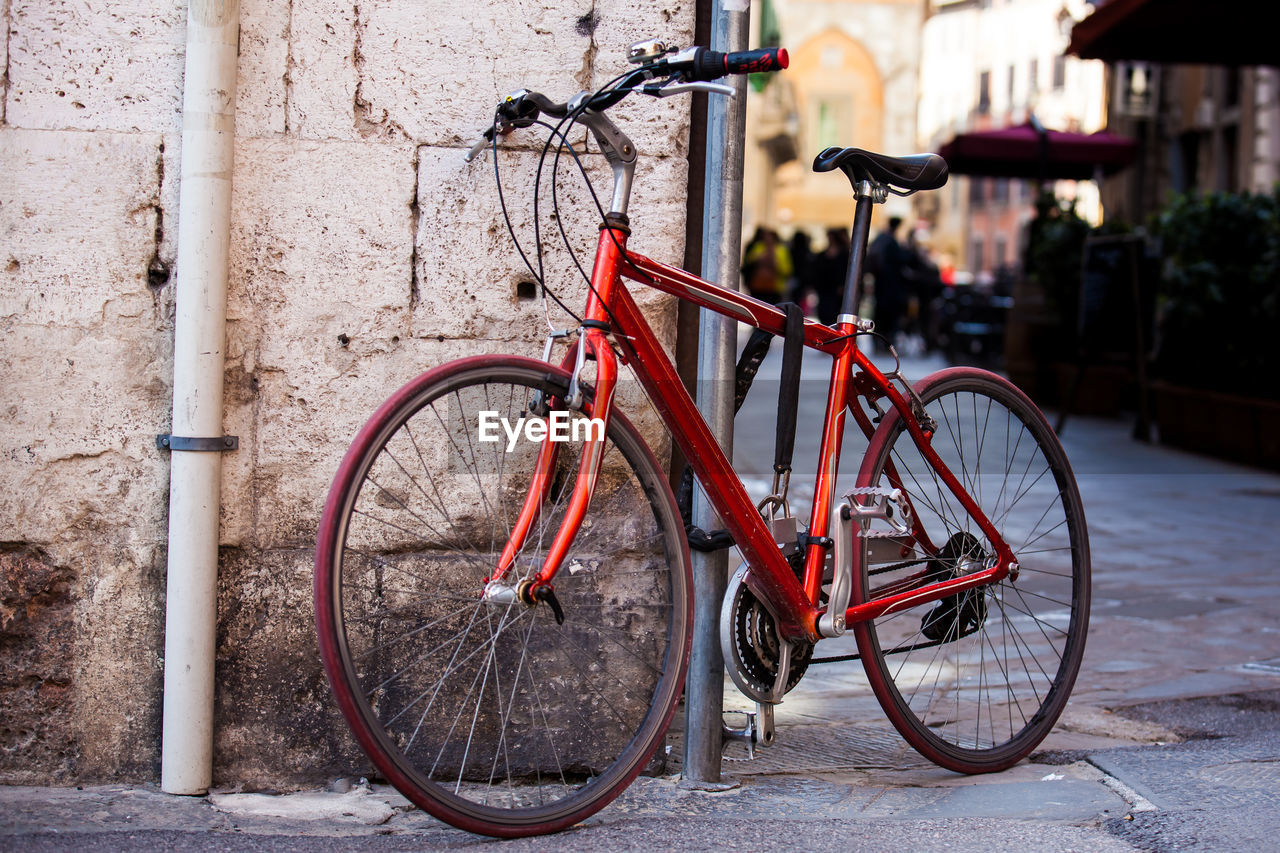 Parked bicycle at the beautiful streets of pisa