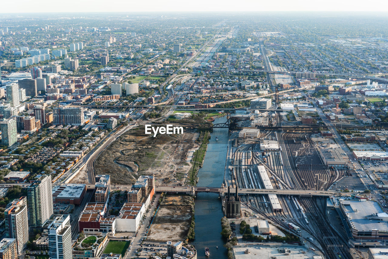 HIGH ANGLE VIEW OF STREET AND BUILDINGS IN CITY