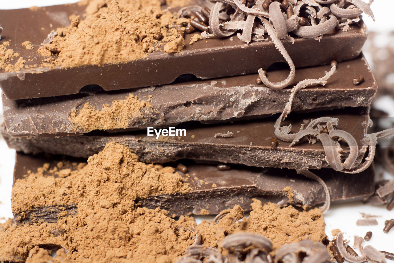 Close-up of chocolate bars and powder