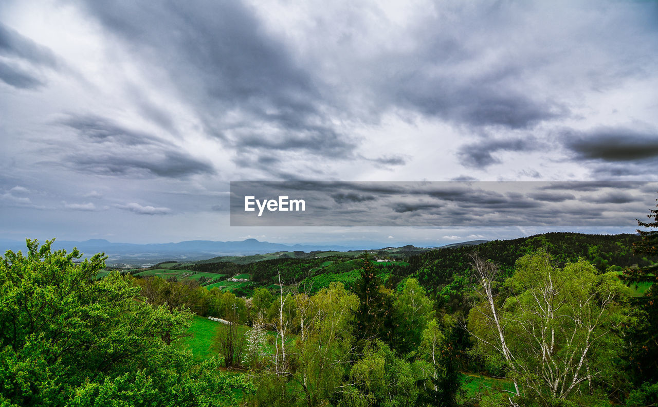 VIEW OF LANDSCAPE AGAINST CLOUDY SKY