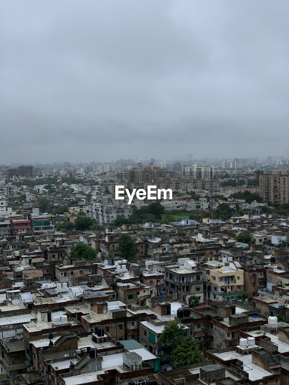 High angle view of buildings in city against sky