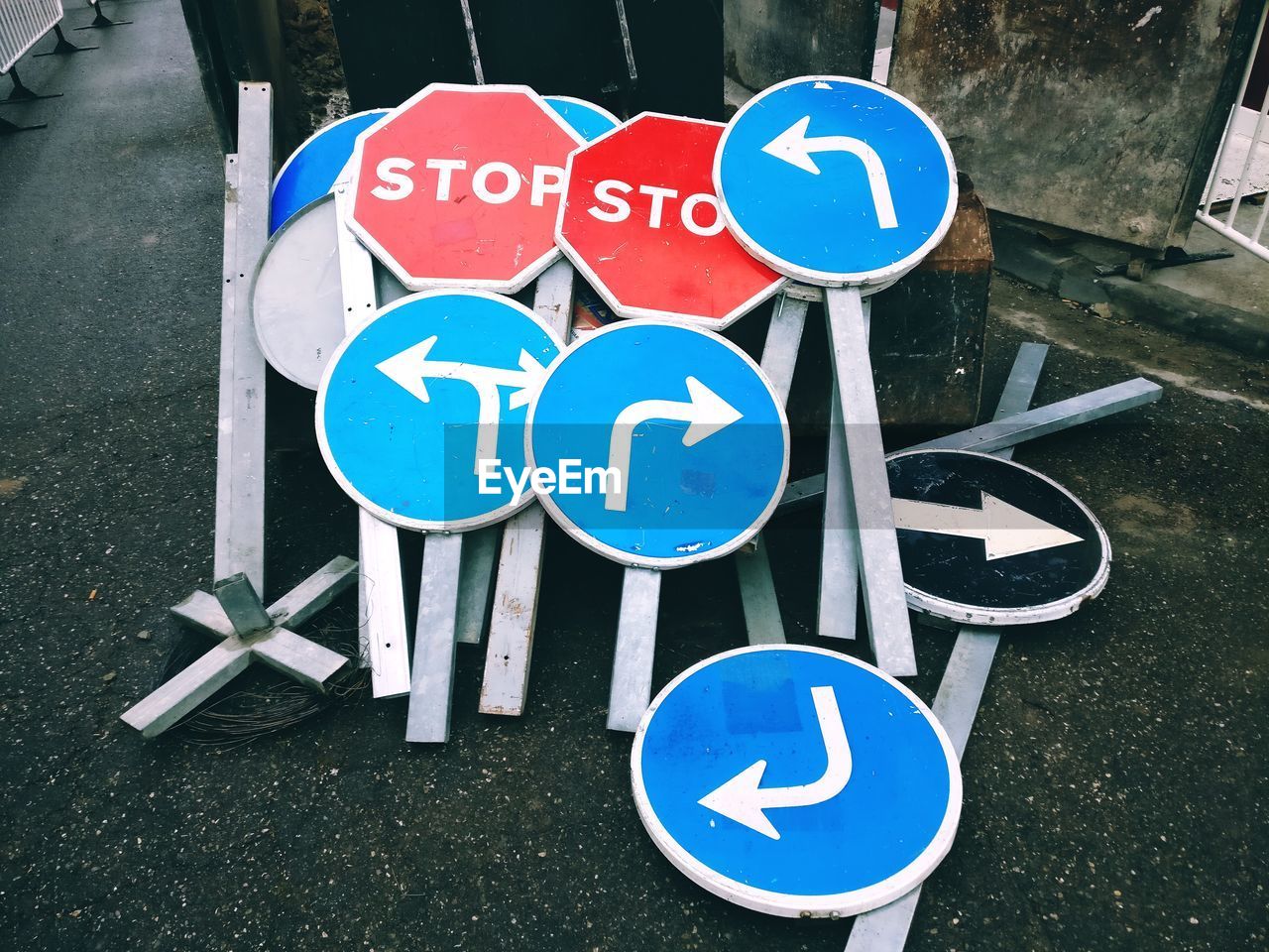 High angle view of road signs on street