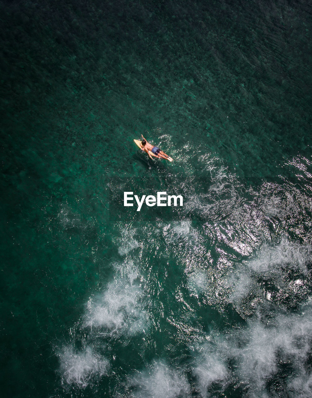 High angle view of people on sea. surfing 