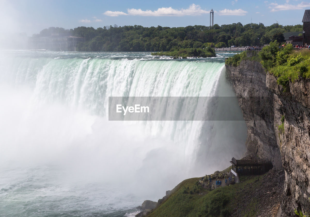 PANORAMIC VIEW OF WATERFALL AT SEASIDE