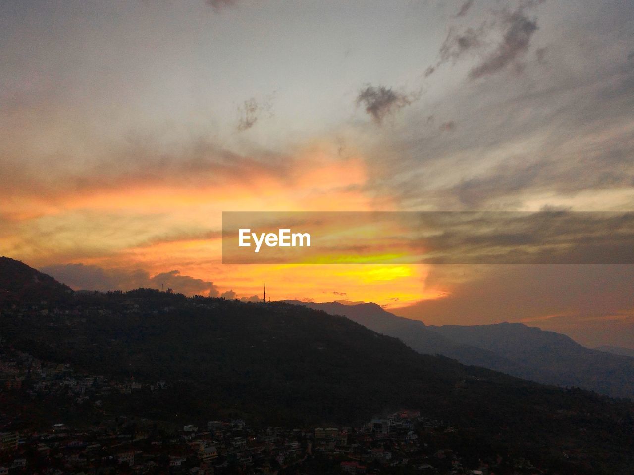 SUNSET OVER MOUNTAINS