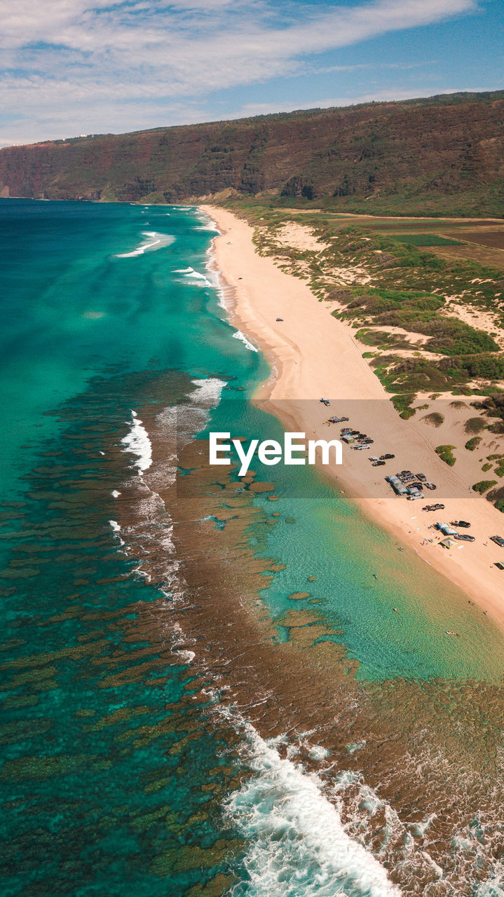 HIGH ANGLE VIEW OF SEA SHORE