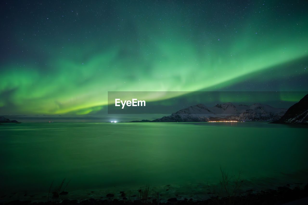 scenic view of sea against clear sky at night