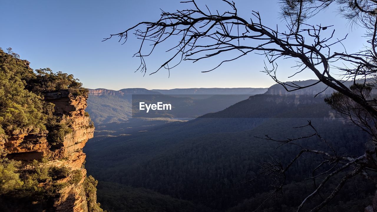 Scenic view of mountains against clear sky