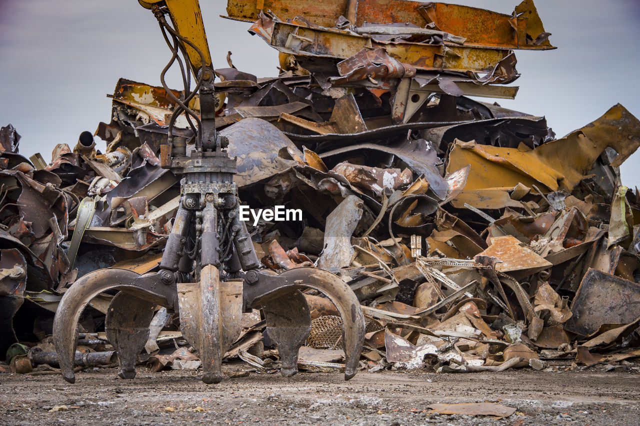 OLD RUSTY WHEEL ON FIELD