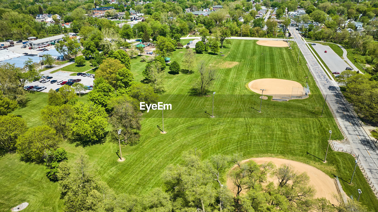 high angle view of people walking on field