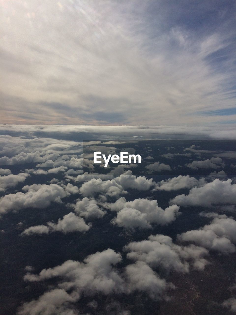 AERIAL VIEW OF LANDSCAPE AGAINST CLOUDY SKY