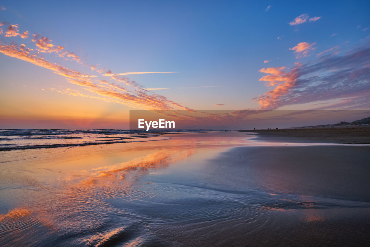 scenic view of sea against sky at sunset