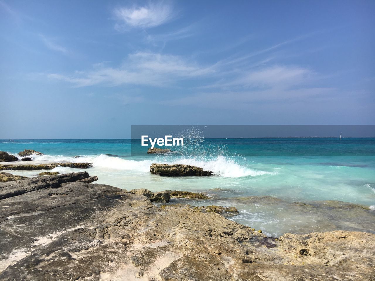 Scenic view of beach against sky