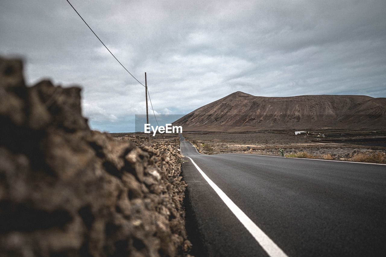 ROAD PASSING THROUGH LANDSCAPE