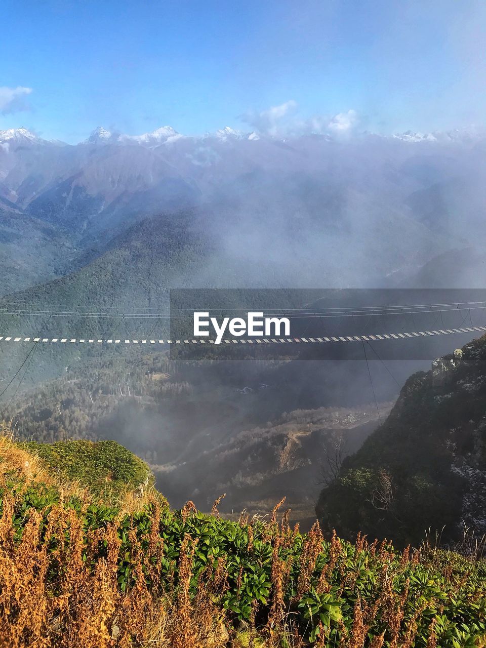 SCENIC VIEW OF MOUNTAIN RANGE AGAINST SKY
