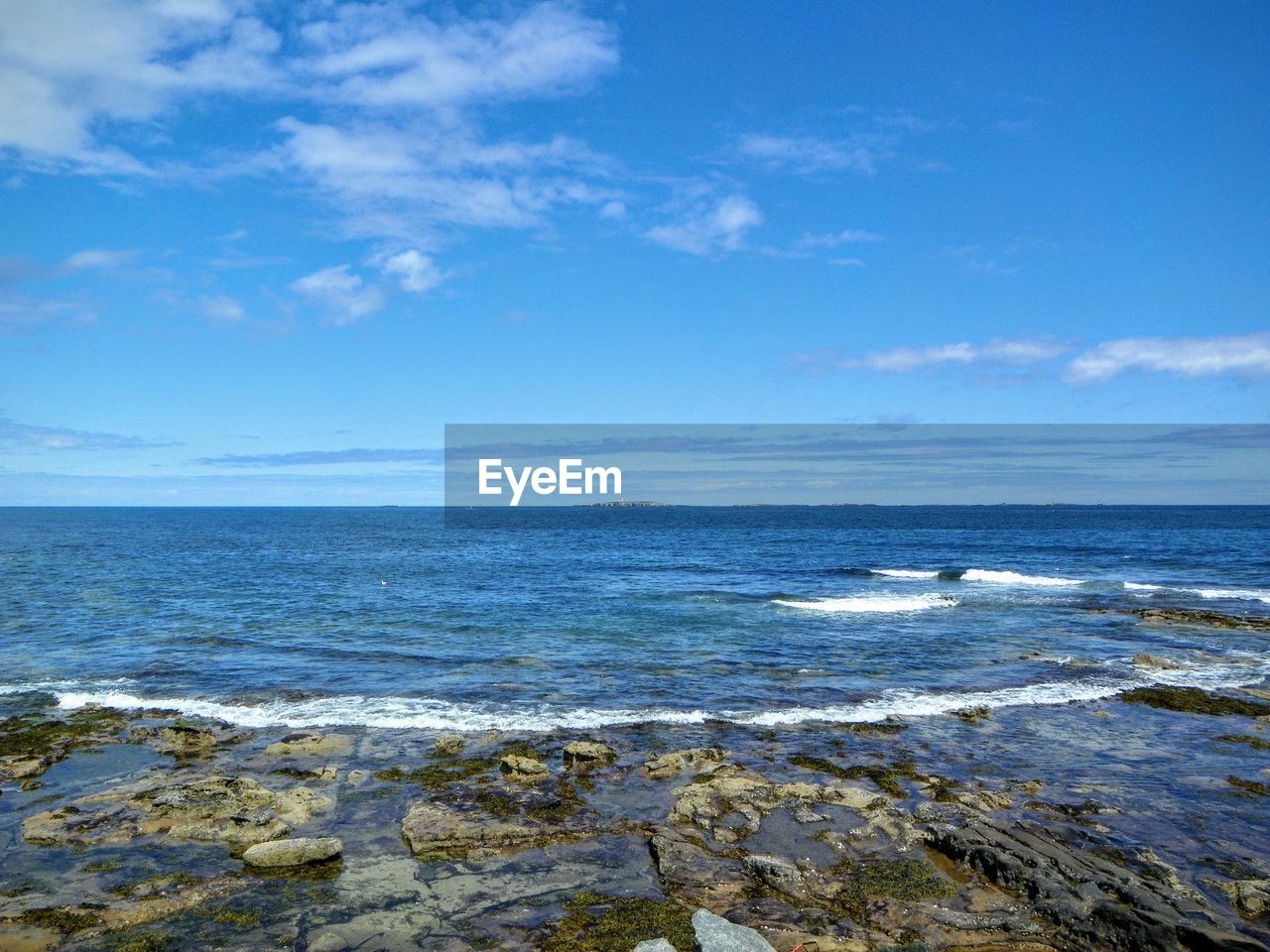 Seascape against sky