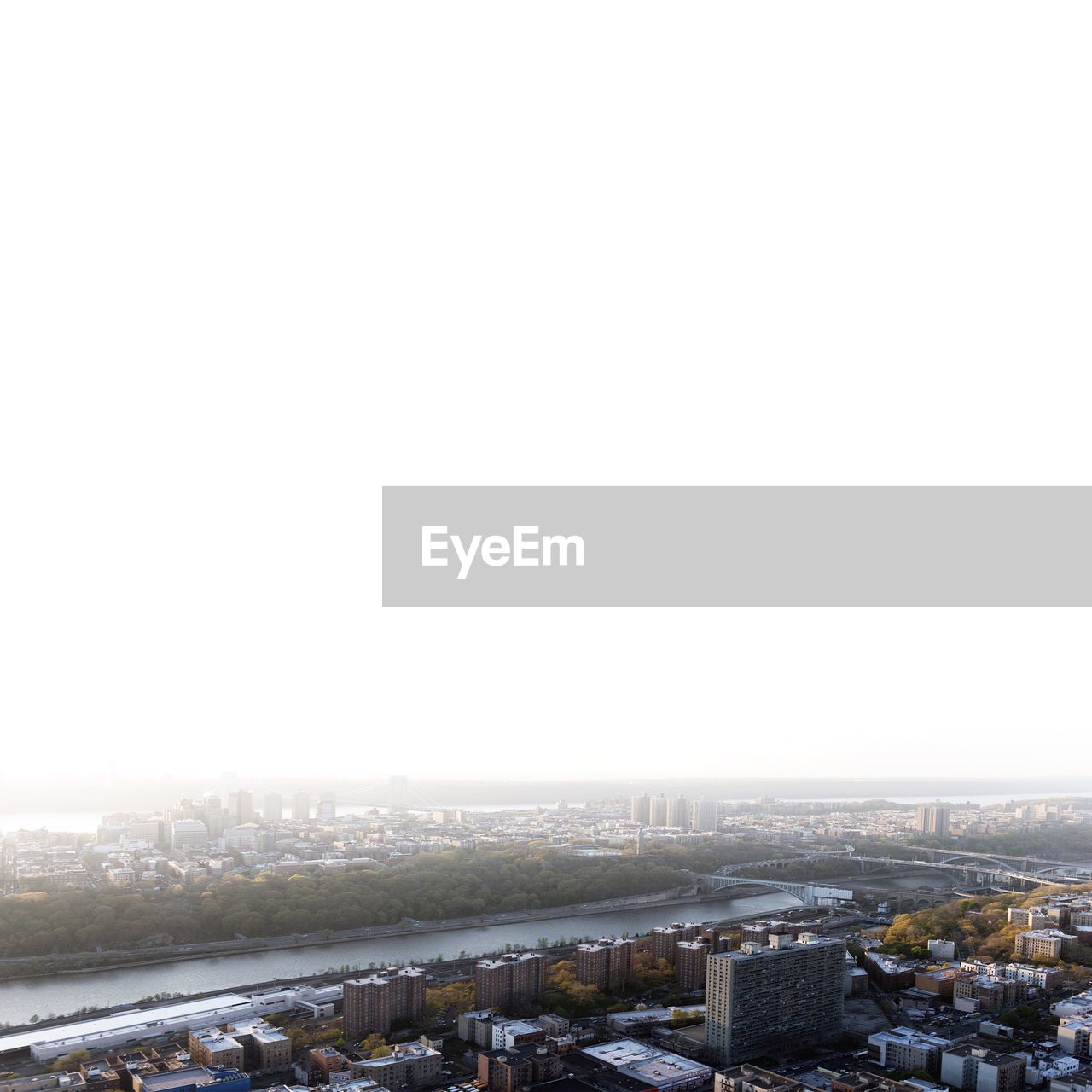 High angle view of buildings in city against clear sky