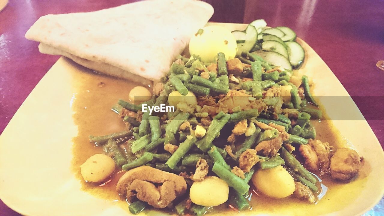 CLOSE-UP OF SERVED FOOD IN PLATE