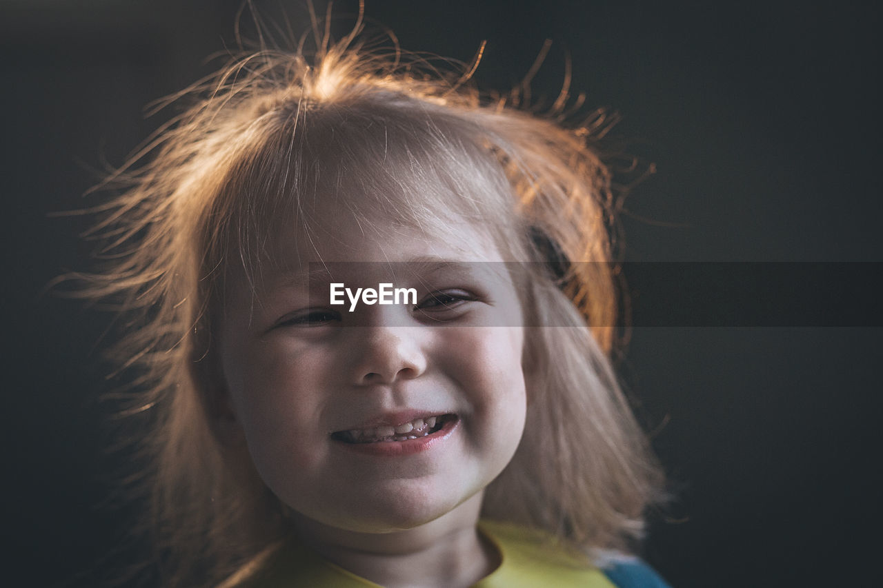 Close-up portrait of a smiling girl