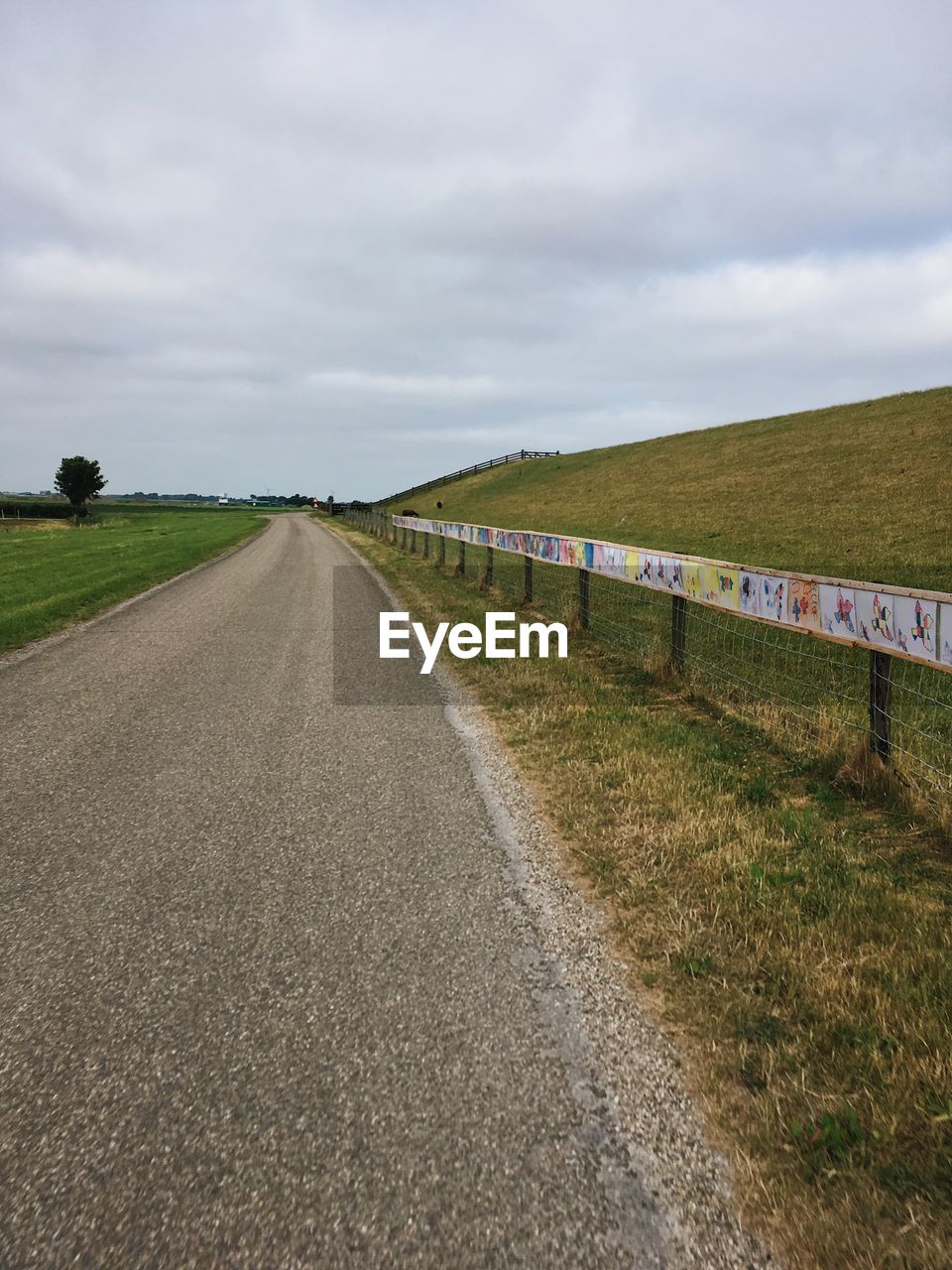 EMPTY ROAD ALONG LANDSCAPE