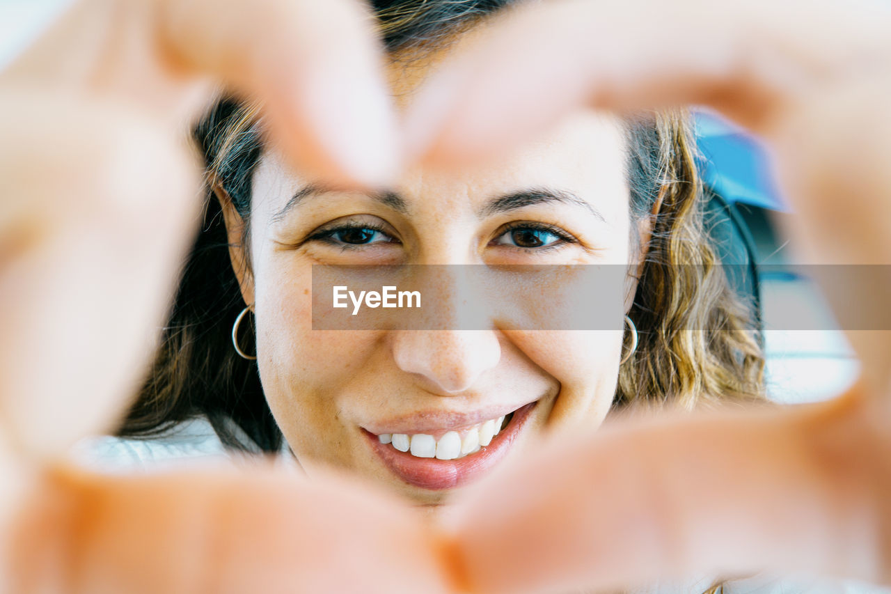 portrait, adult, close-up, skin, women, headshot, portrait photography, selective focus, smiling, emotion, happiness, two people, young adult, human face, focus on background, teenager, female, lifestyles, looking at camera, photo shoot, togetherness, cheerful, positive emotion, bride, person, leisure activity, brown hair, human eye, ceremony, enjoyment, fun, front view, human head, day, outdoors, looking