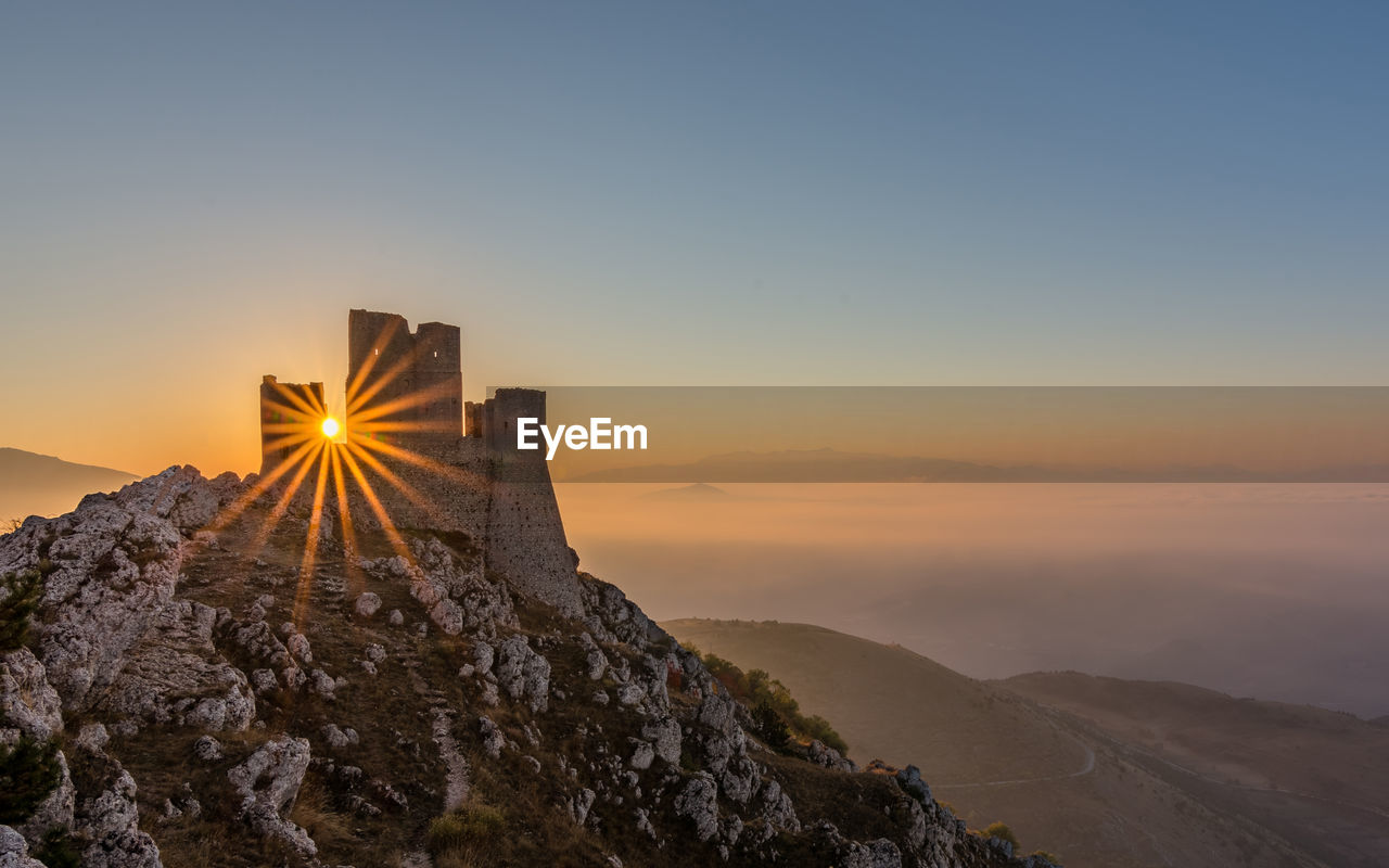 Fort against sky during sunset