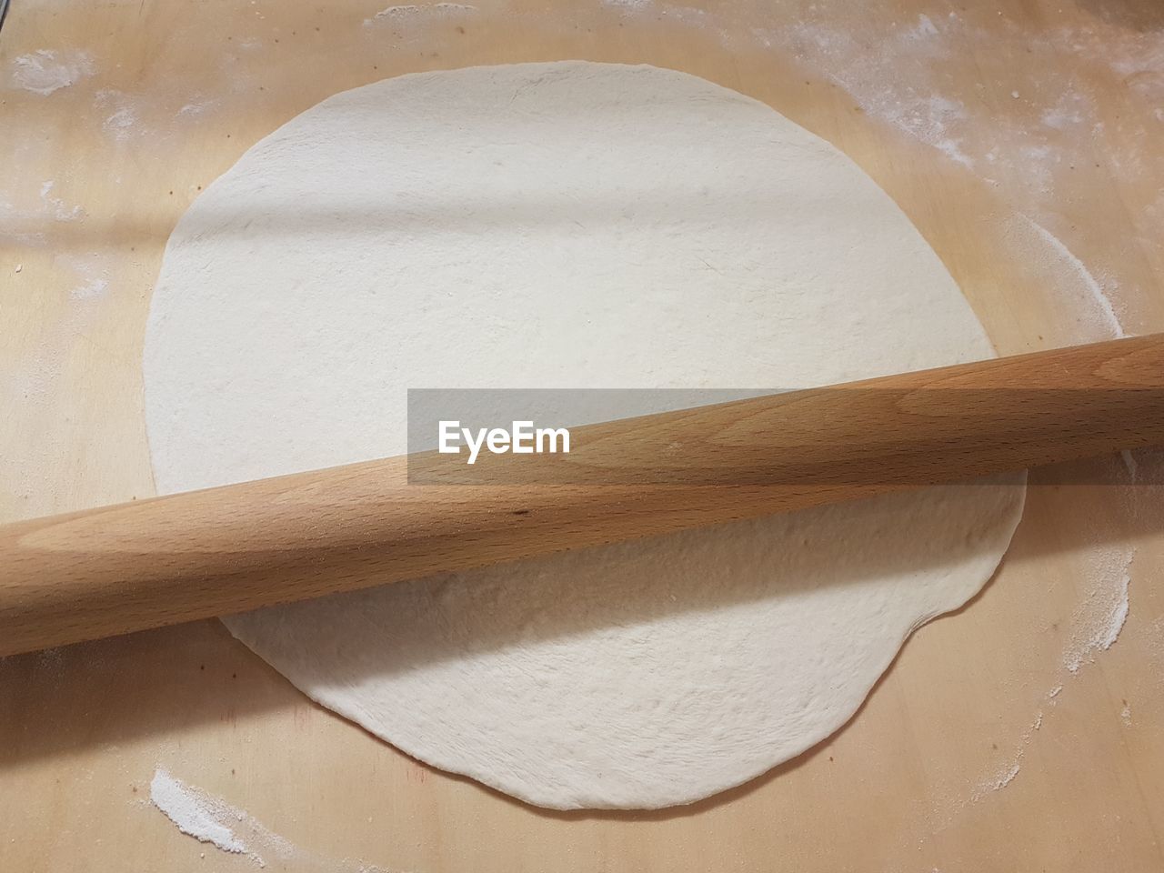 High angle view of pizza dough