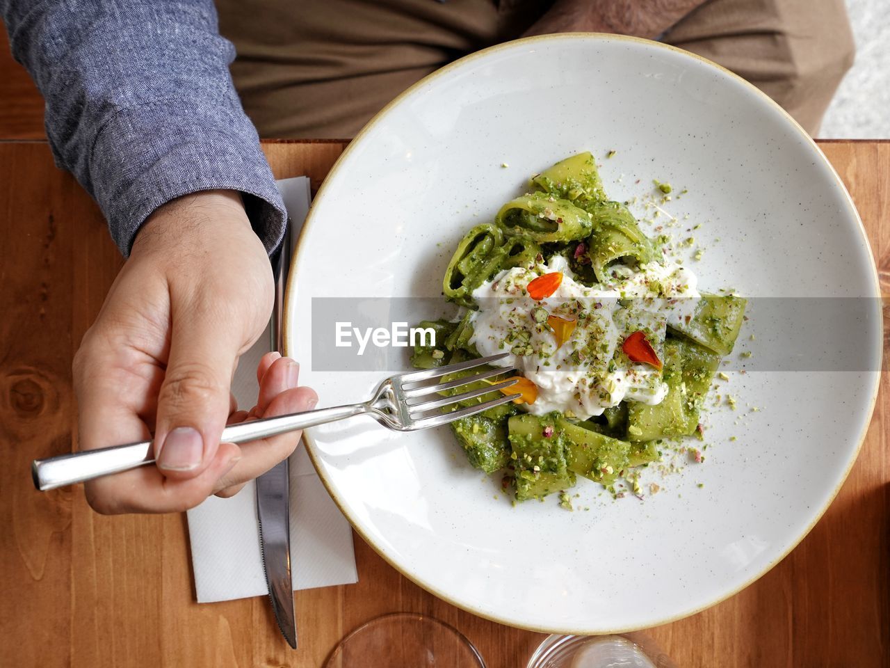 High angle view of person preparing food in plate