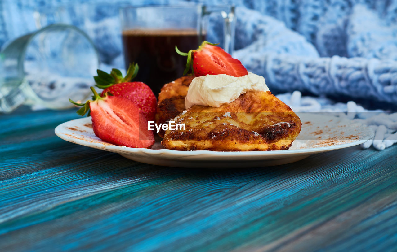 CLOSE-UP OF BREAKFAST ON TABLE