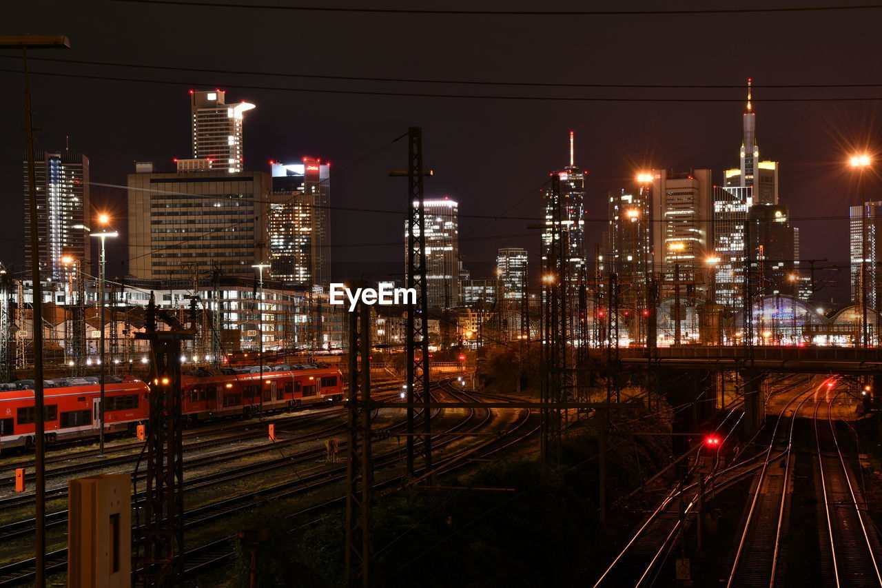 HIGH ANGLE VIEW OF TRAIN AT NIGHT