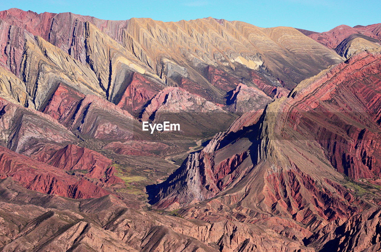 Aerial view of landscape with mountain range in background