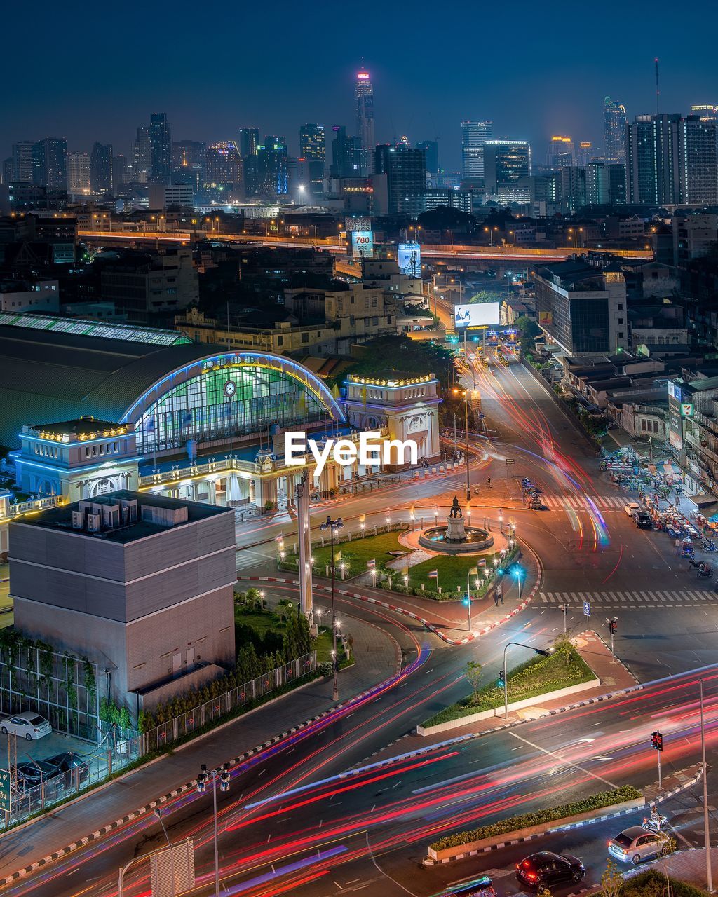 High angle view of illuminated city buildings at night