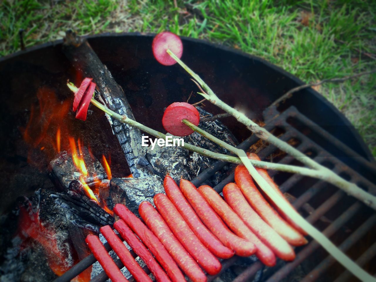 Close-up of barbecuing sausages